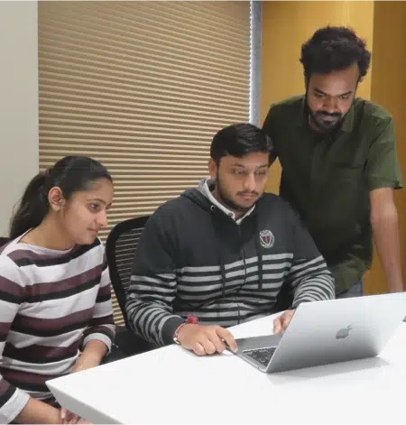 Three Team member of UX Team discussing the project